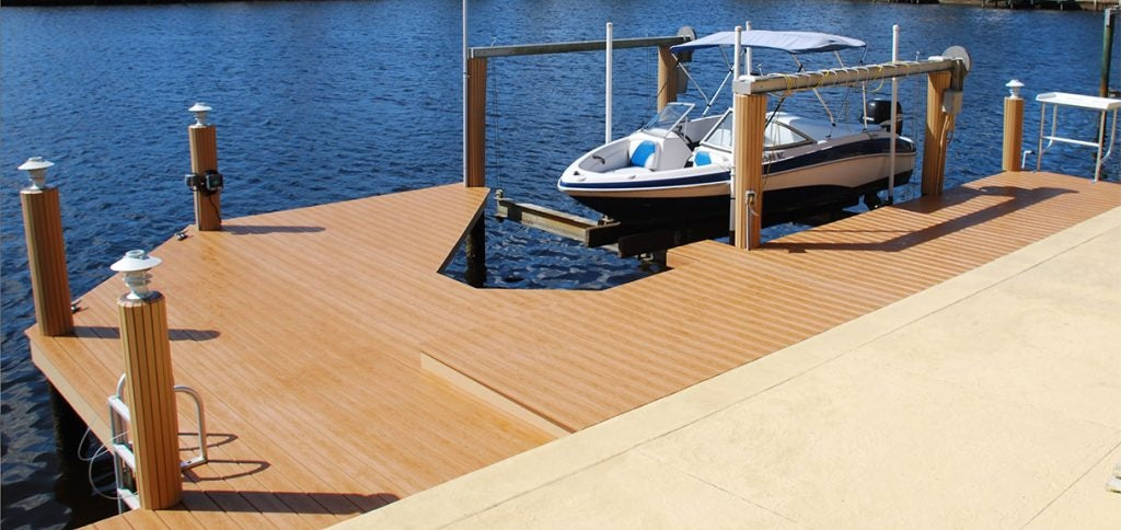 Custom waterfront dock with boat lift